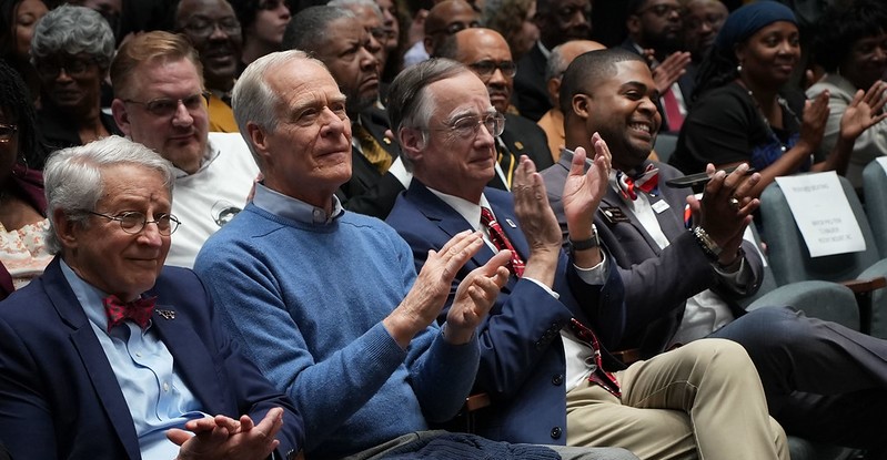 Former mayors clapping